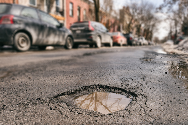 How Can Potholes Damage Your Vehicle