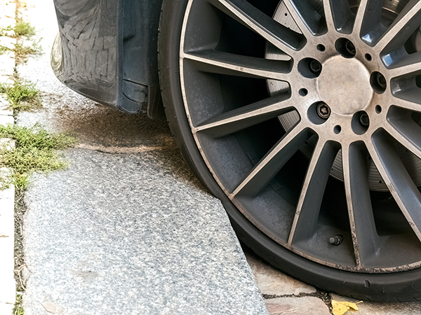 How Do Potholes and Obstacles Effect Wheel Alignment | Admiral Tire and Auto